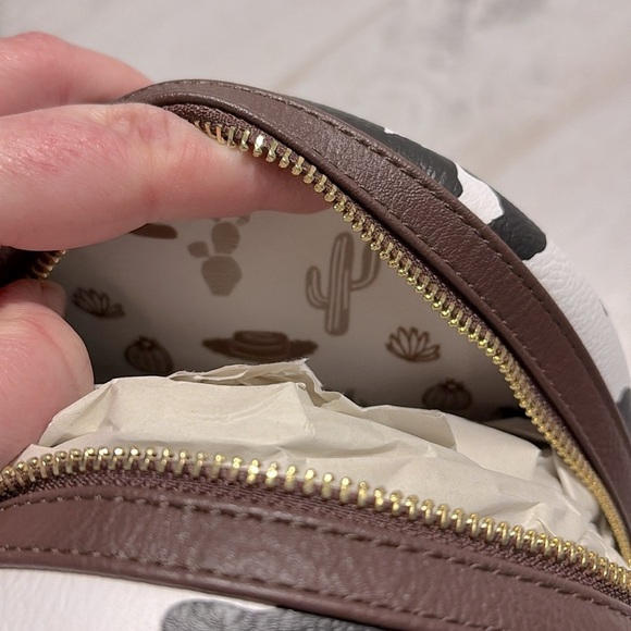 Loungefly Pixar backpack featuring a Woody motif from Toy Story NWT